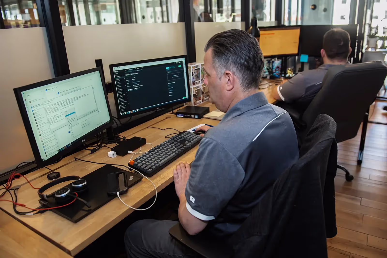 IT specialist managing and optimizing company IT infrastructure