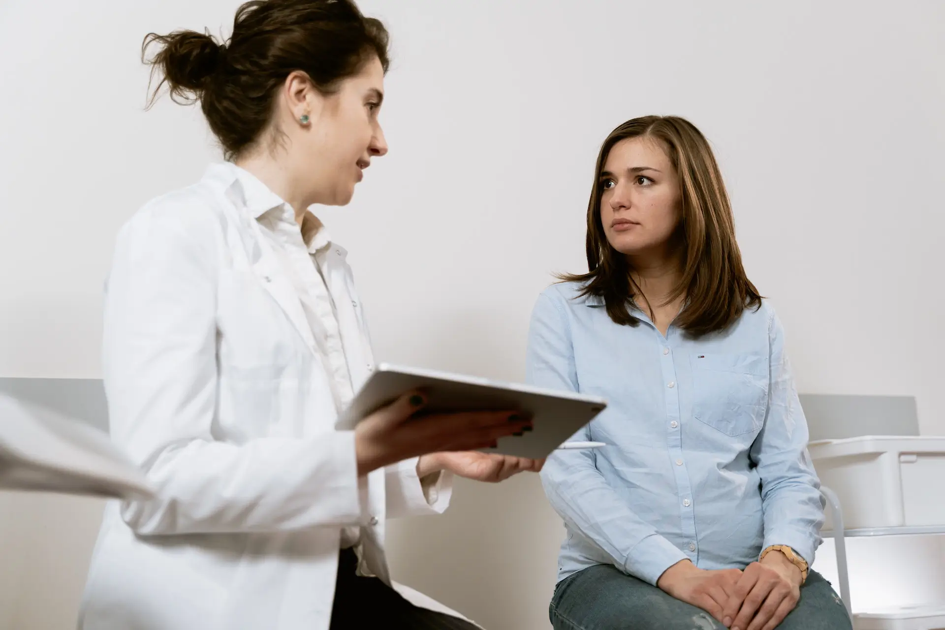 A doctor talking to his patient