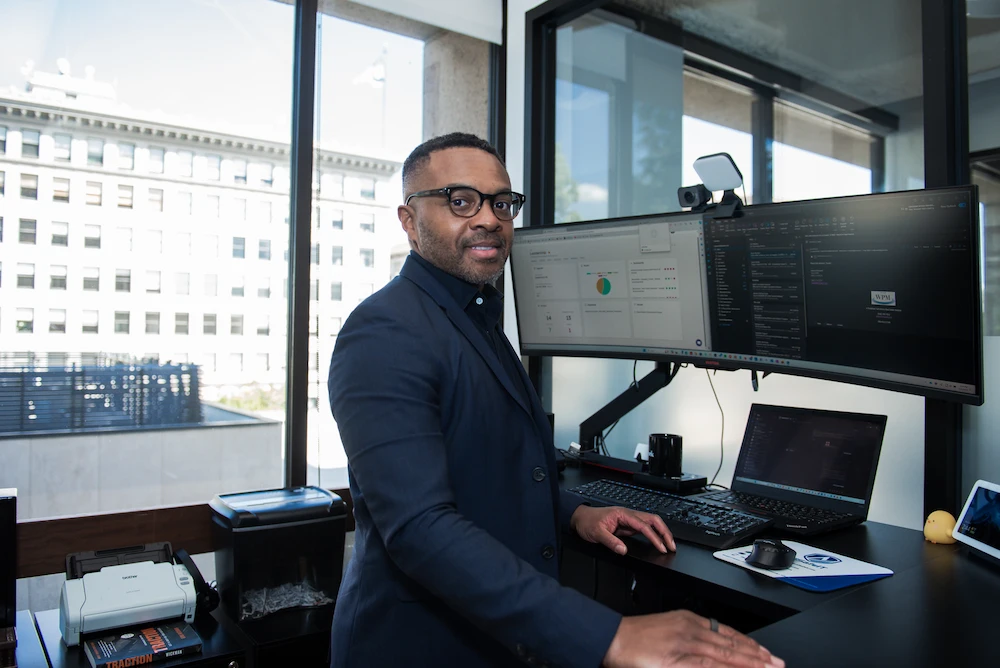 an executive overviewing the IT compliance services at our Office 
