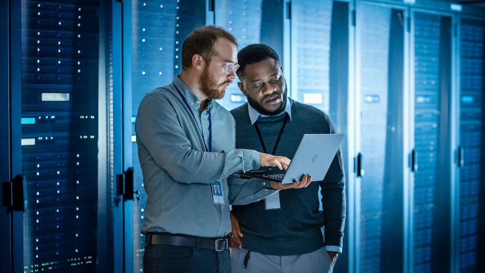 Managed IT team performing cloud migration services for business systems
