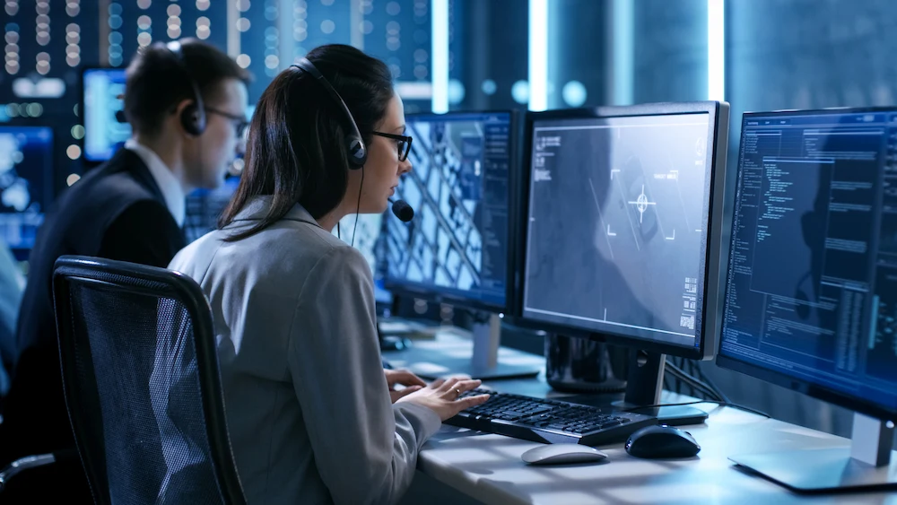 IT specialists managing virtual servers through Infrastructure as a Service